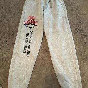 Under Armour Gray Sweatpants with Black and Red Print